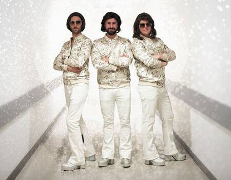 BeeGees cover band posing